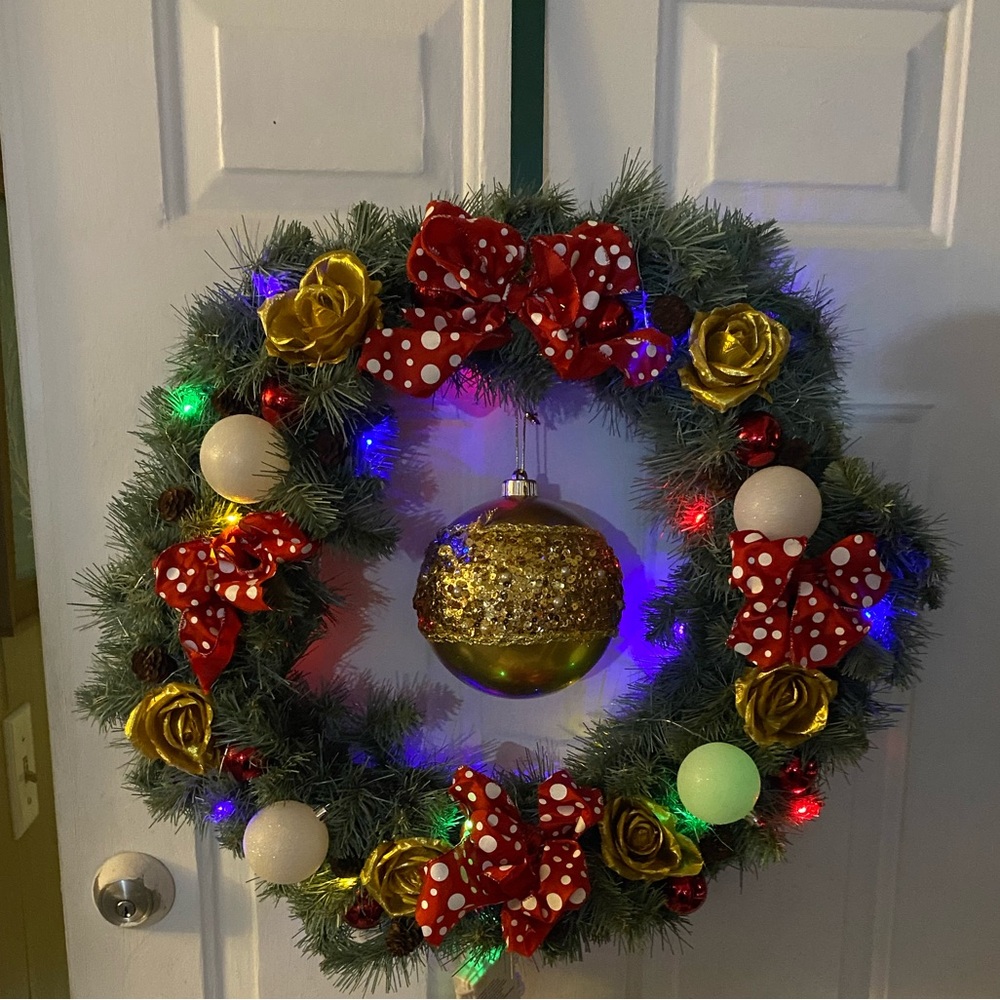 Festive Holiday Wreath with Red and Gold Accents